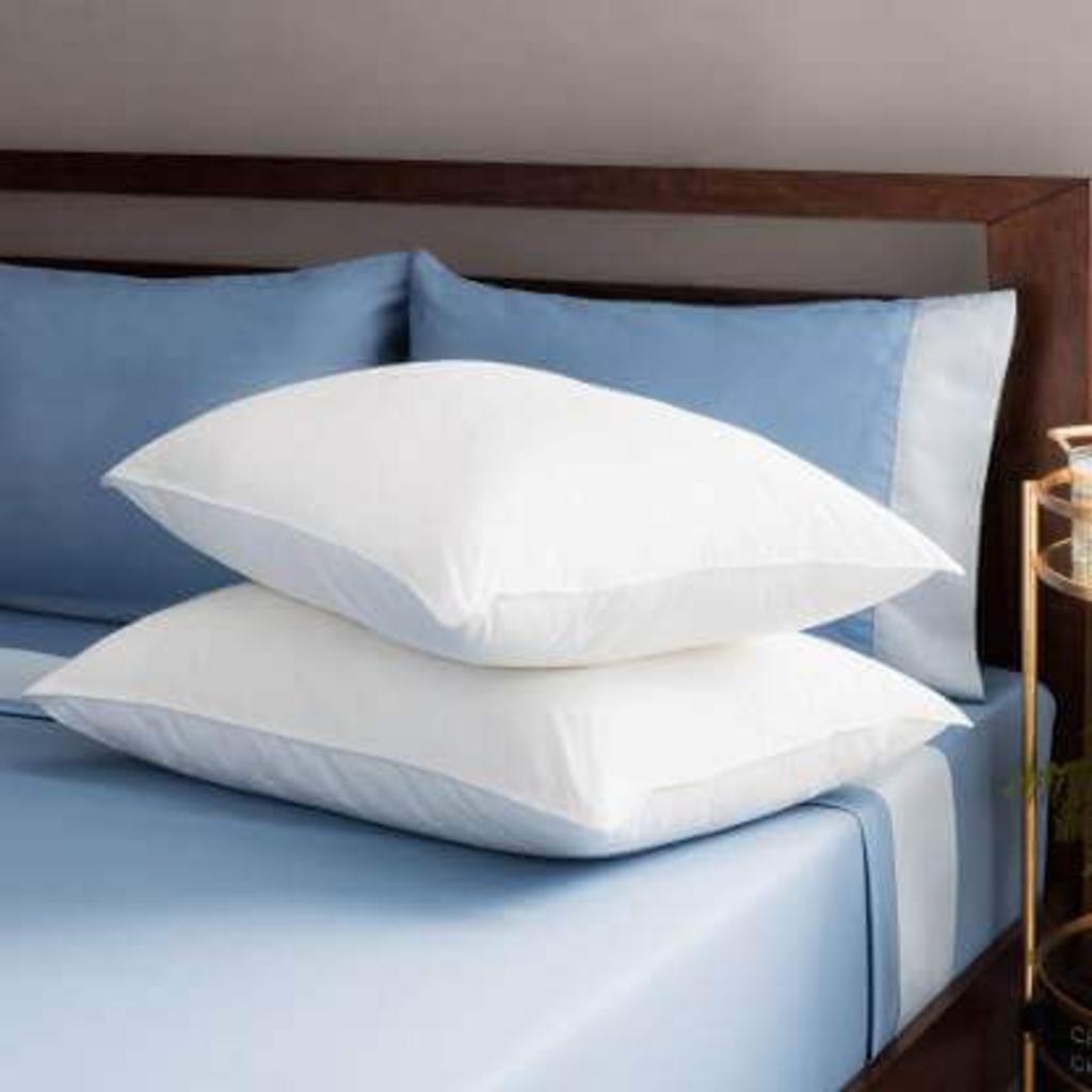 Gối bông Doona Promo — êm mềm, thoáng khí, kích thước chuẩn 45x65cm.