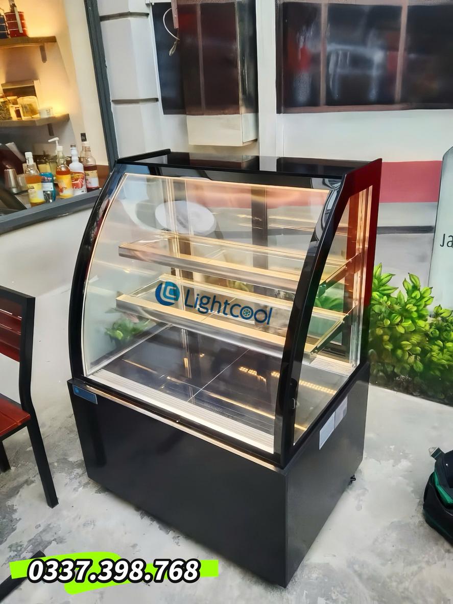 Dàn lạnh đồng và máy nén NFH70NA cho làm lạnh nhanh và bền bỉ, ít hao điện hơn than conventional systems (nêu số liệu tiết kiệm nếu có).","imagePrompt":"Close-up photo of the compressor and copper condenser inside the cabinet; technician pointing to the compressor, with temperature display visible."},{