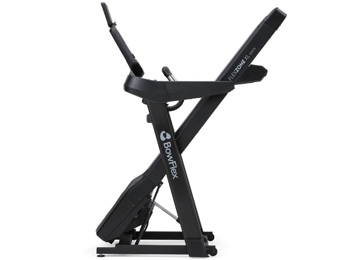 Sàn chạy FlexZone XL 152 x 56 cm với hệ giảm chấn 3 vùng - hiển thị mặt chạy và biểu đồ giảm sốc; style: in-situ home gym, neutral tones, close-up on deck materials, high detail.