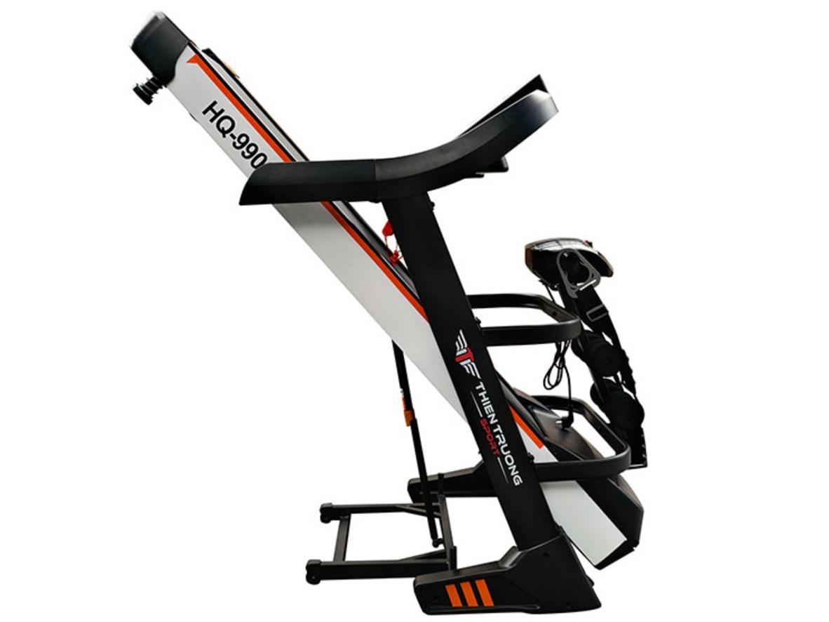Động cơ DC mạnh mẽ cho hiệu suất ổn định khi chạy bộ trên HQ-9900 - Siêu Thị Đại Việt (ảnh minh họa) - show motor close-up, label specs: 4.0HP (peak 5.5HP).","imagePrompt":"Close-up of treadmill motor and control console, emphasis on power label, studio lighting.